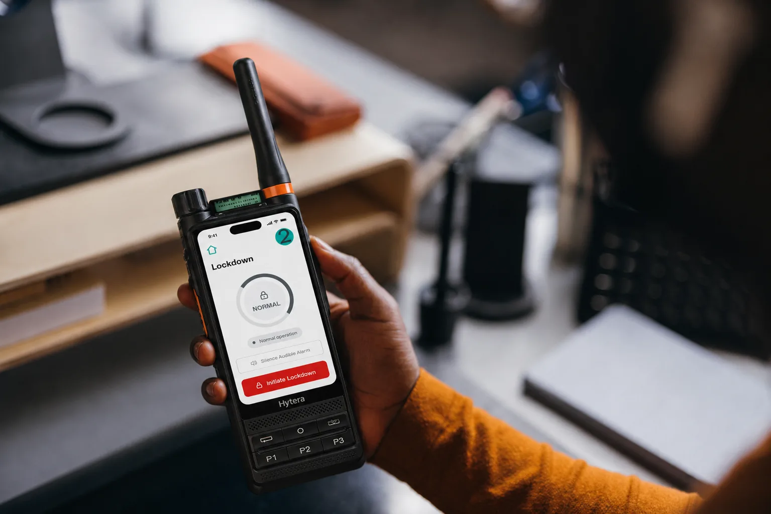 Hytera Android DMR running FACES2 Mobile, held in hand