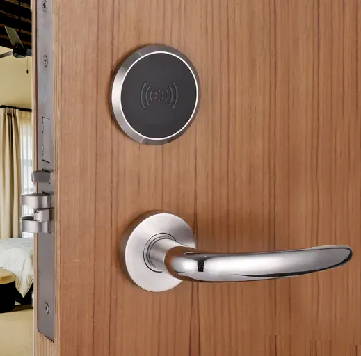 Two-piece battery-powered hotel lock with a compact round contactless reader above a lever