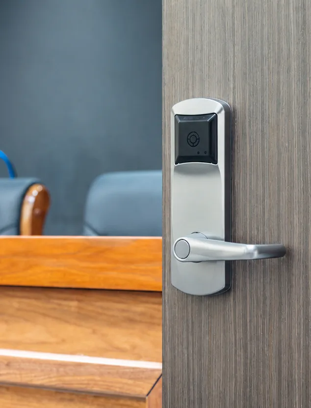 Battery-powered wireless lock on an office boardroom door